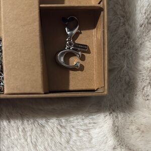 Coach Metallic Silver removable charm - C